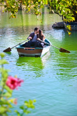 Couple on romantic boat ride. clipart