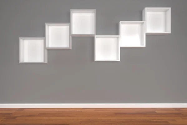 Box Shelves on gray wall — Stock Photo, Image