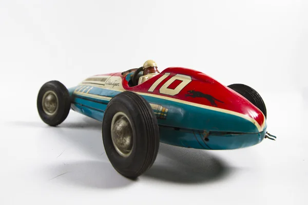 Старая игрушечная гоночная машина — стоковое фото