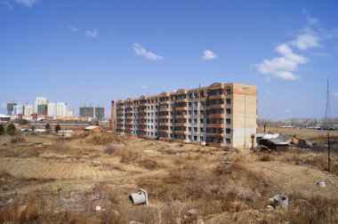 Old six-storey house on the outskirts of Heihe clipart