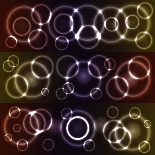 Stock vector Bokeh glowing circles