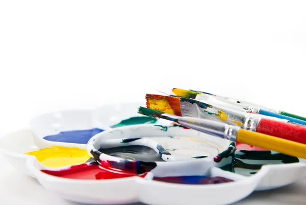 Artist palette with brushes — Stock Photo, Image