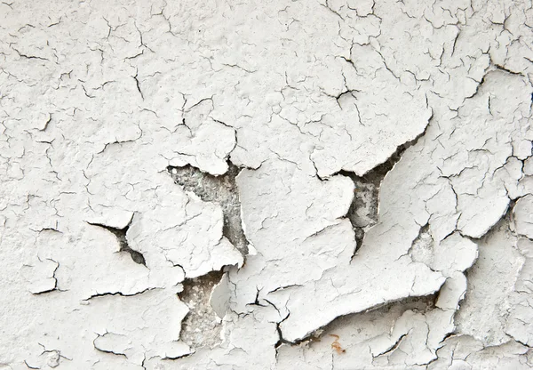 Pintura rachada velha na parede de concreto — Fotografia de Stock
