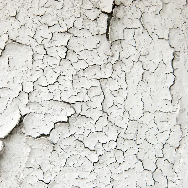 Old cracked paint on the concrete wall — Stock Photo, Image