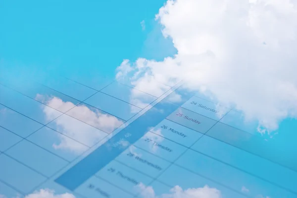 Samenstelling van de agenda en de blauwe hemel — Stockfoto