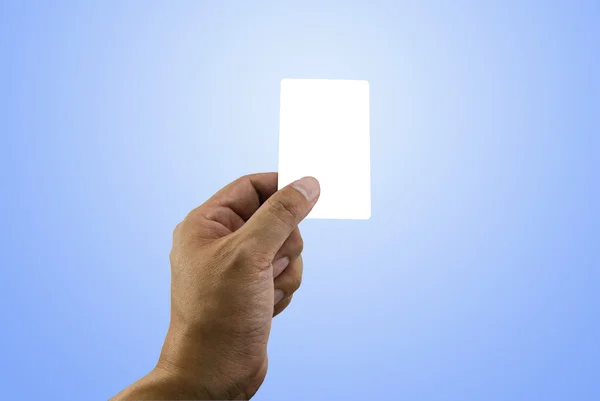 Ruka držící bílý prázdný název karty s ořezovou cestou — Stock fotografie