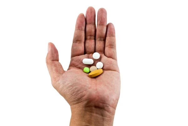 Pillole in mano isolato su bianco — Foto Stock