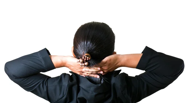 Close up van ontspannen zakenvrouw van achteren met open handen achter haar hoofd — Stockfoto
