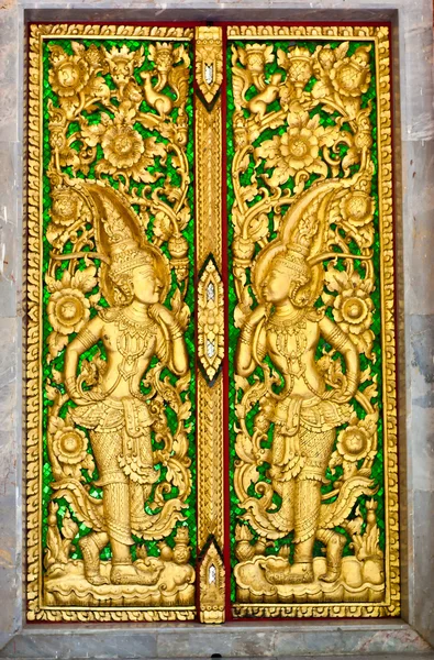 stock image Pattern in traditional Thai style art on door of the temple in Thailand