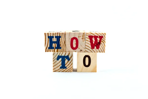 HOW TO word from wood alphabet blocks — Stock Photo, Image