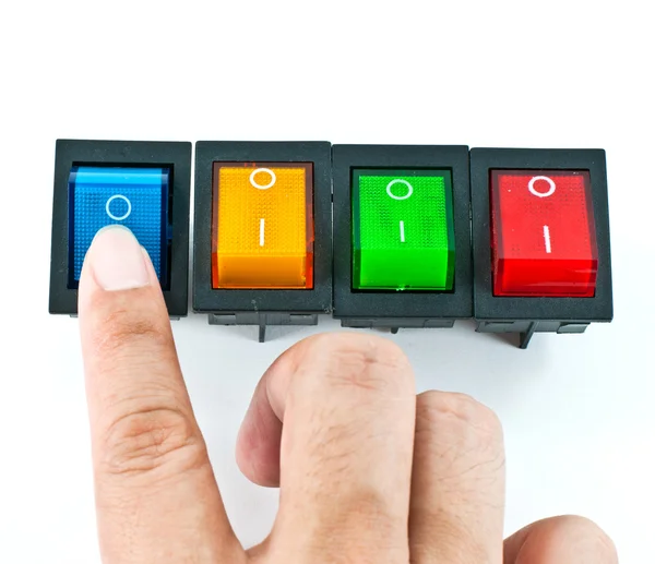 Hand turning on a blue electrical switch — Stock Photo, Image