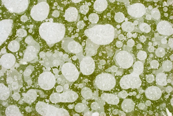 Imagem de fundo da textura do gelo com bolhas de ar — Fotografia de Stock