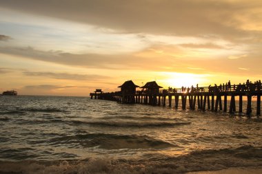 Sunset in Naples pier clipart