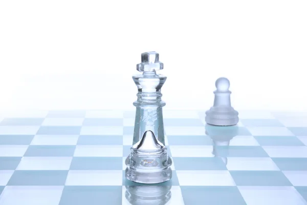 stock image Glass chess on board