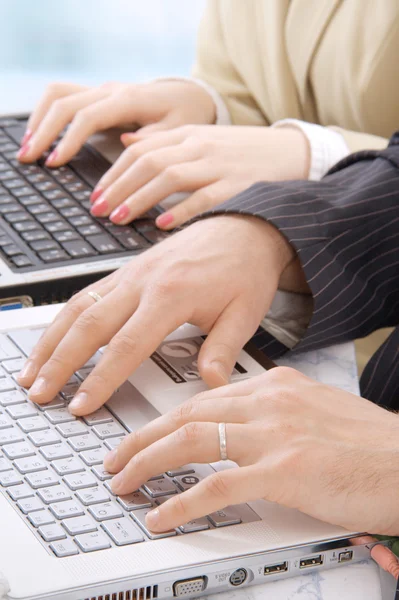 Hands of business on notebook keyboard — Stock Photo, Image