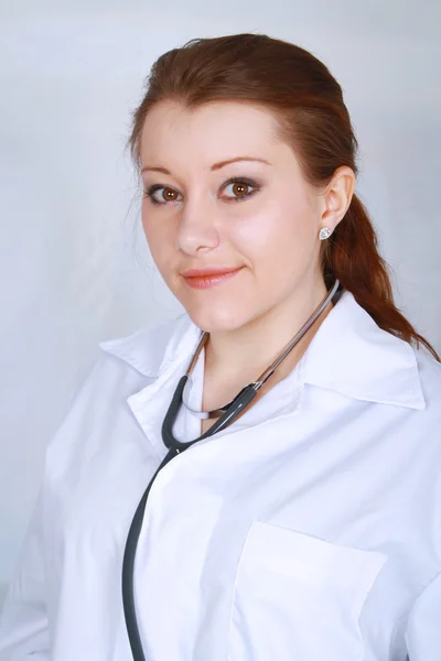 Portrait of beautiful asian female medical doctor smiling — Stock Photo, Image