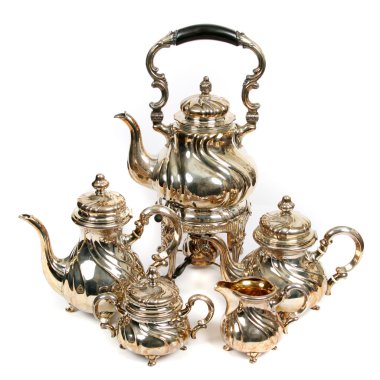 Antiquarian teapots still life on white background clipart