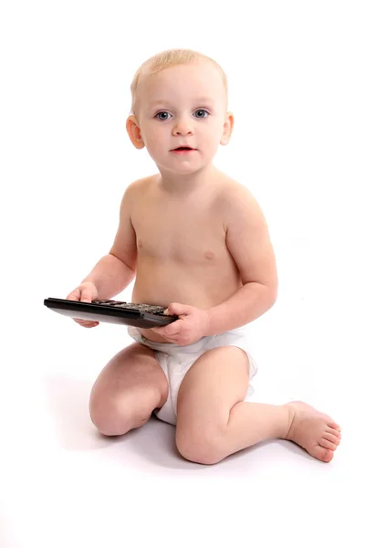 Małe dziecko użyć Kalkulatora. łapka na biały — Zdjęcie stockowe