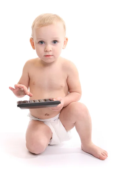 Baby benutzte Taschenrechner über Weiß. Studioaufnahme. — Stockfoto
