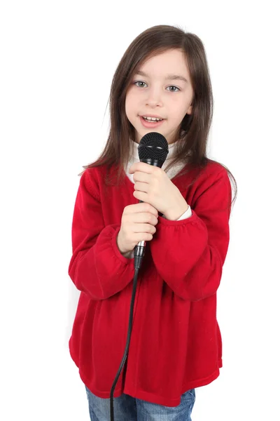 Dziewczyna śpiewa z mikrofonem — Zdjęcie stockowe