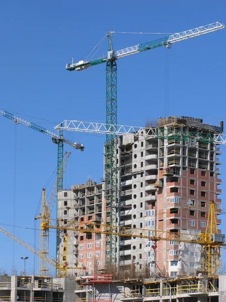 Six cranes on construction site — Stock Photo, Image