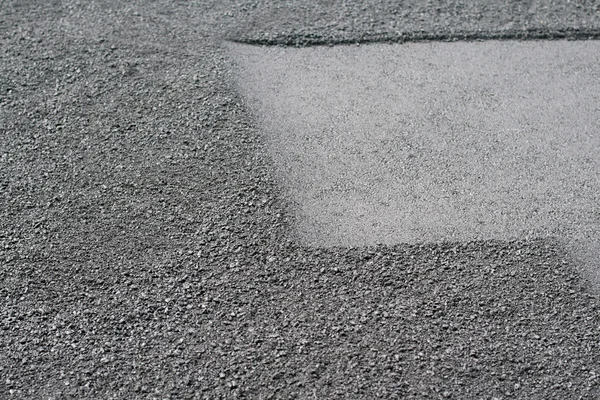 Nuevo asfalto unevan caliente — Foto de Stock
