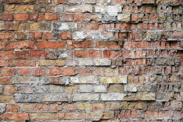 Textura danificada da parede de tijolo — Fotografia de Stock