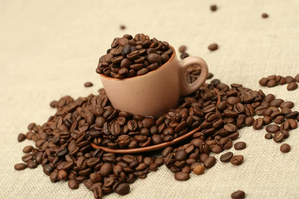 Full cup of coffee beans — Stock Photo, Image