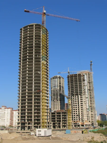 Five concrete skycrapers construction site — Stock Photo, Image