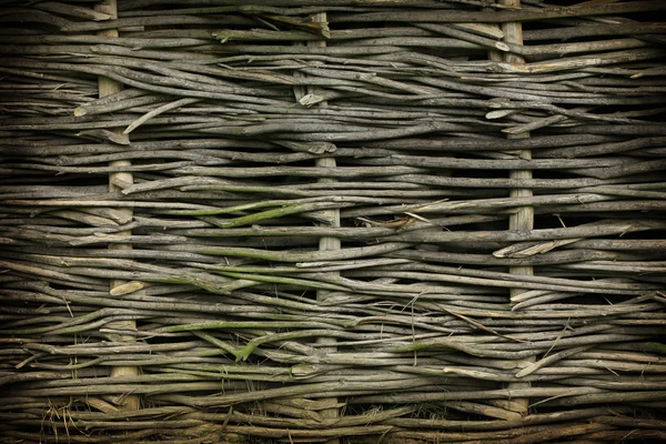 枝編み細工品フェンス背景のクローズ アップ — ストック写真