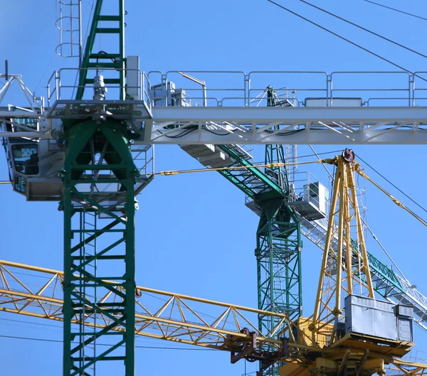Cranes on construction site — Stock Photo, Image
