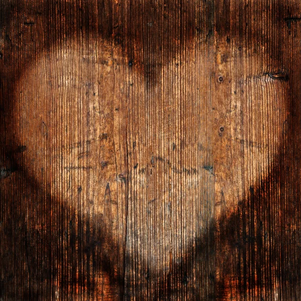 风化的木材墙上的心 — 图库照片