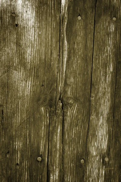 Fondo de pared de madera vieja y envejecida con clavos oxidados — Foto de Stock