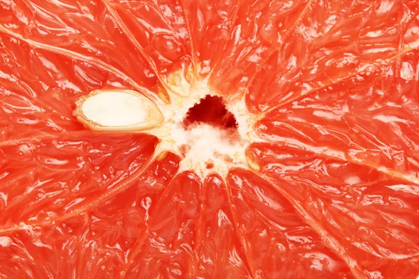Red grapefruit cut texture — Stock Photo, Image