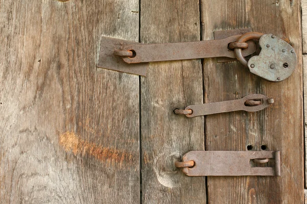 Wzór drzwi z stary kłódka — Zdjęcie stockowe