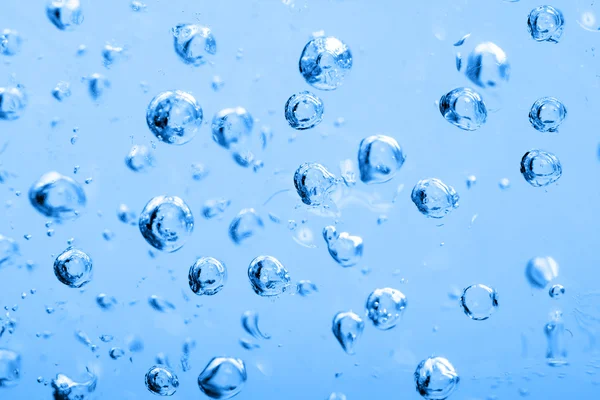 Bolhas de ar abstrato fundo azul — Fotografia de Stock