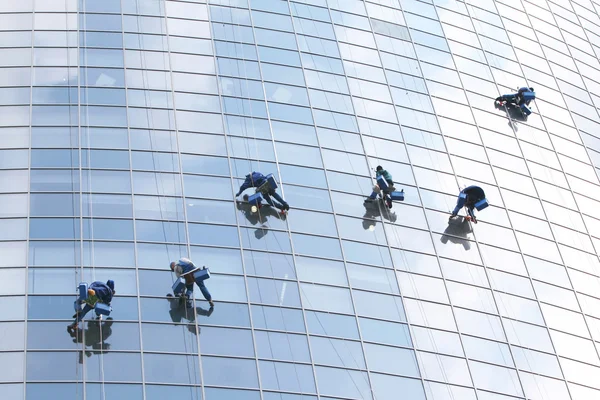 Six workers on office building — Stock Photo, Image