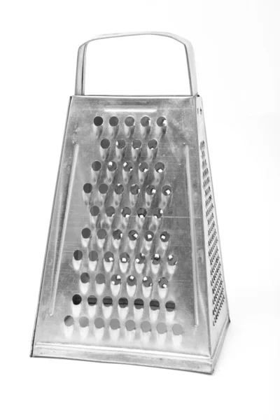 Metal grater isolated over white. Studio photography. — Stock Photo, Image
