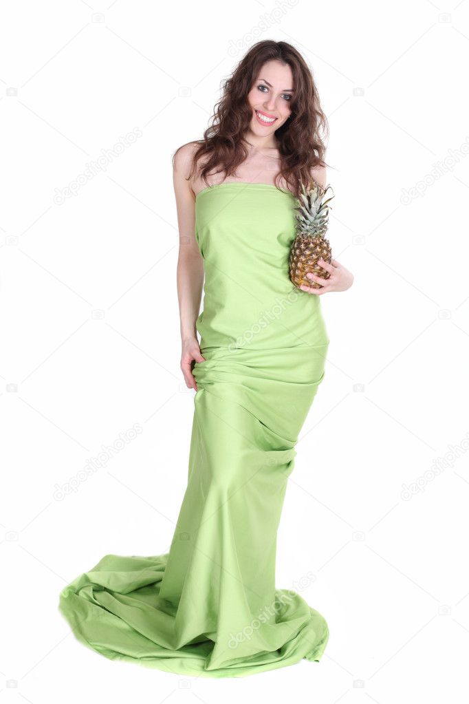 Young and healthy girl with pineapple in her hands isolated on w