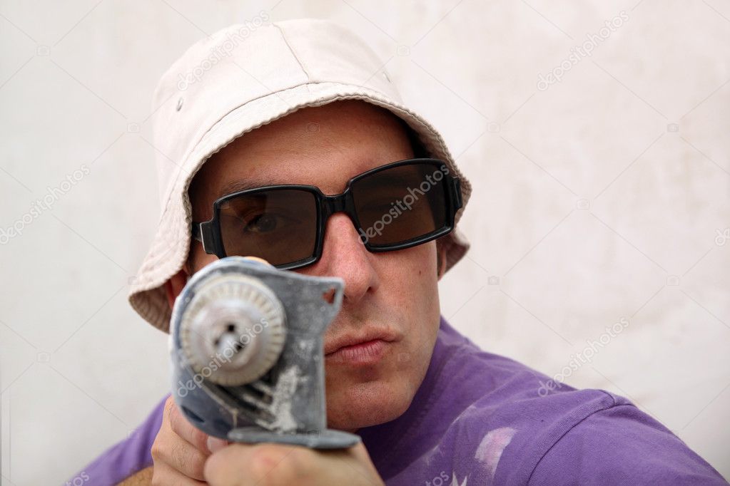 Man with electric drill