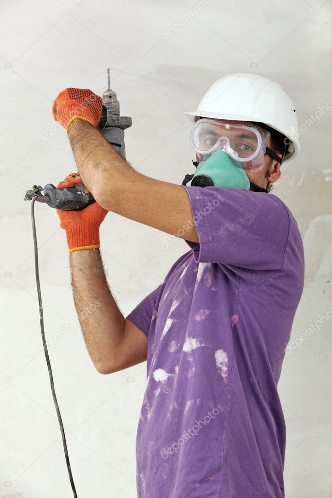 Handyman holding drill