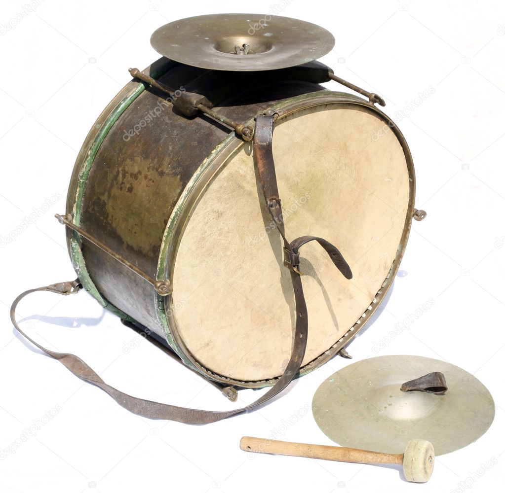 Big vintage orchestral drum with cymbals and beater on white bac