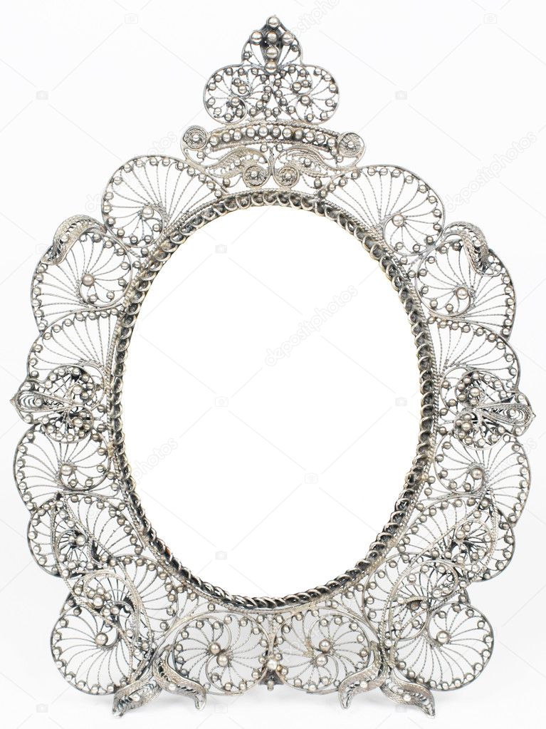 Old antique silver frame over white background