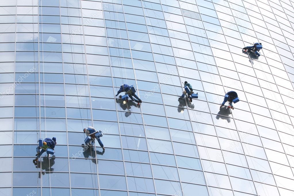 Six workers on office building