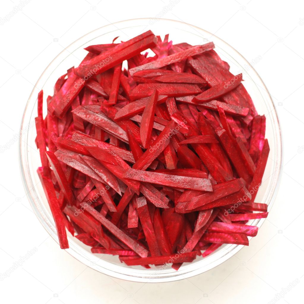 Sliced red beetroot in a bowl isolated