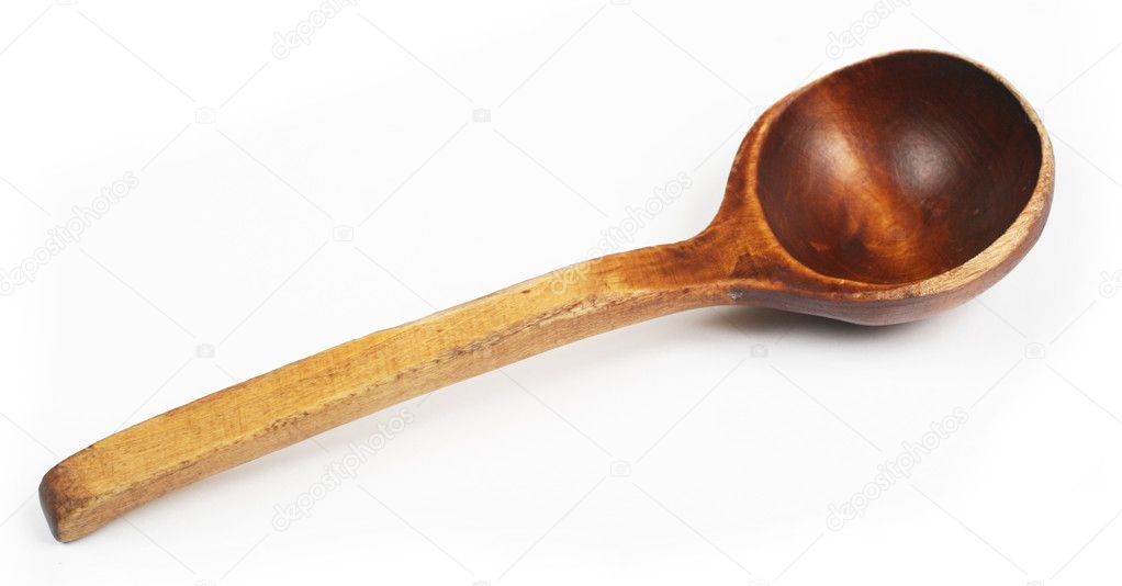Old wooden spoon isolated on white