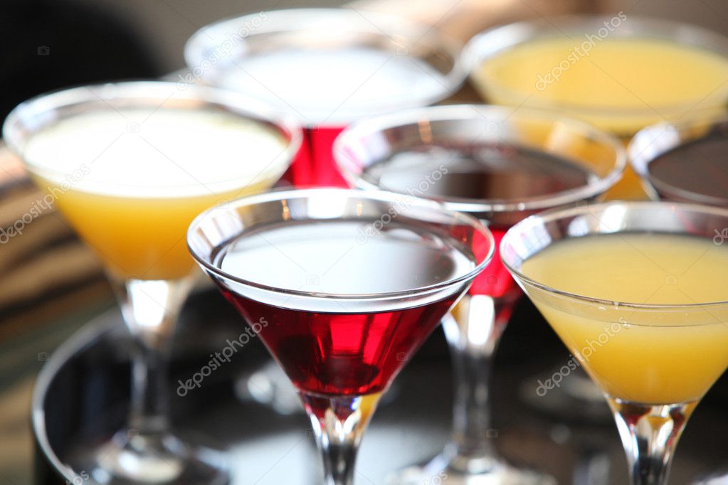 Alcohol cocktails on a tray (soft focus)
