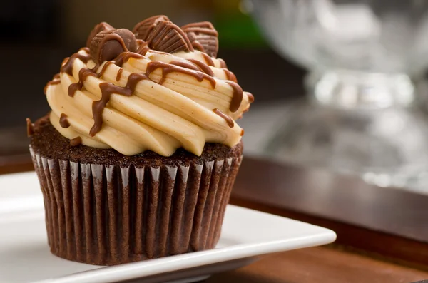 Peanut Butter Cupcake on Wood — Stock Photo, Image