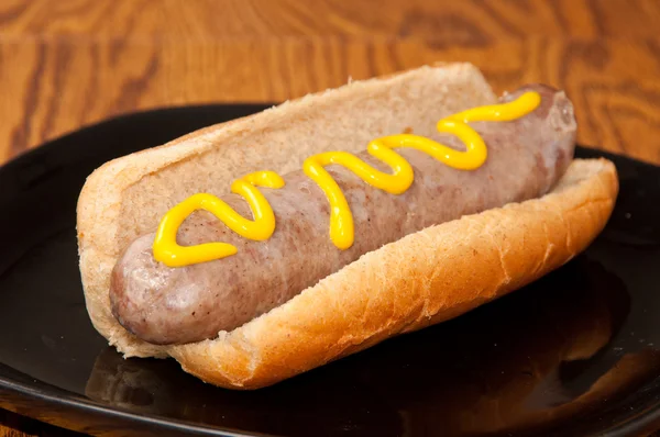 Bratwurst mustárral — Stock Fotó