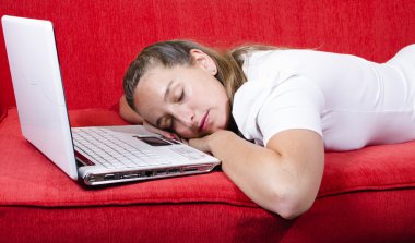 Woman falls asleep while working clipart